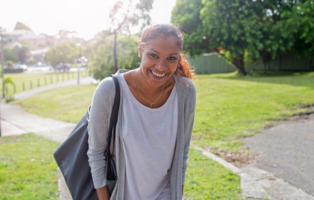 Aboriginal woman smiling outdoors